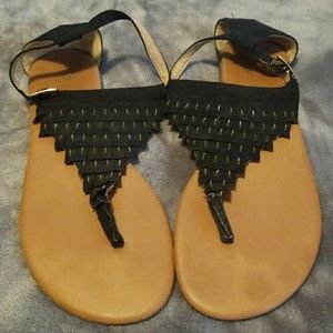 Black/tan sandals.